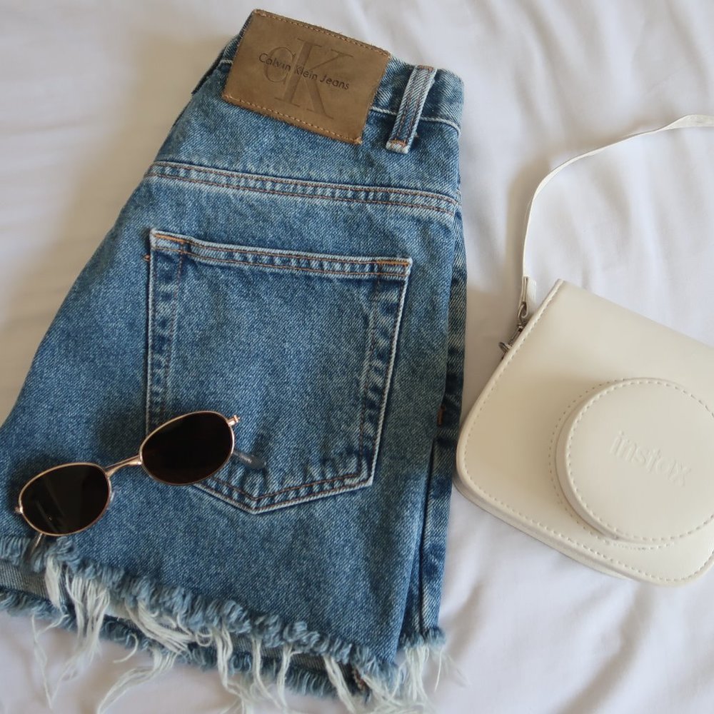 Calvin Klein High Waisted Distressed Jean Shorts